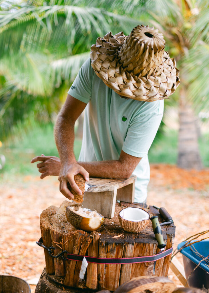 Making fresh shaved coconut at Punakea Farm Tour and Tasting on Maui